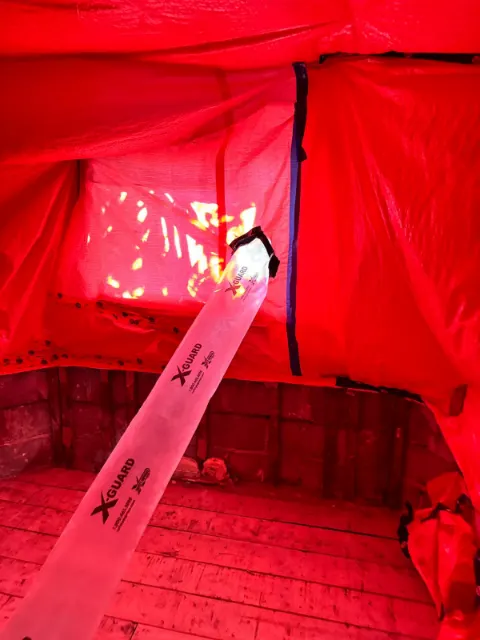 Sealed containment with a negative air duct during mold remediation
