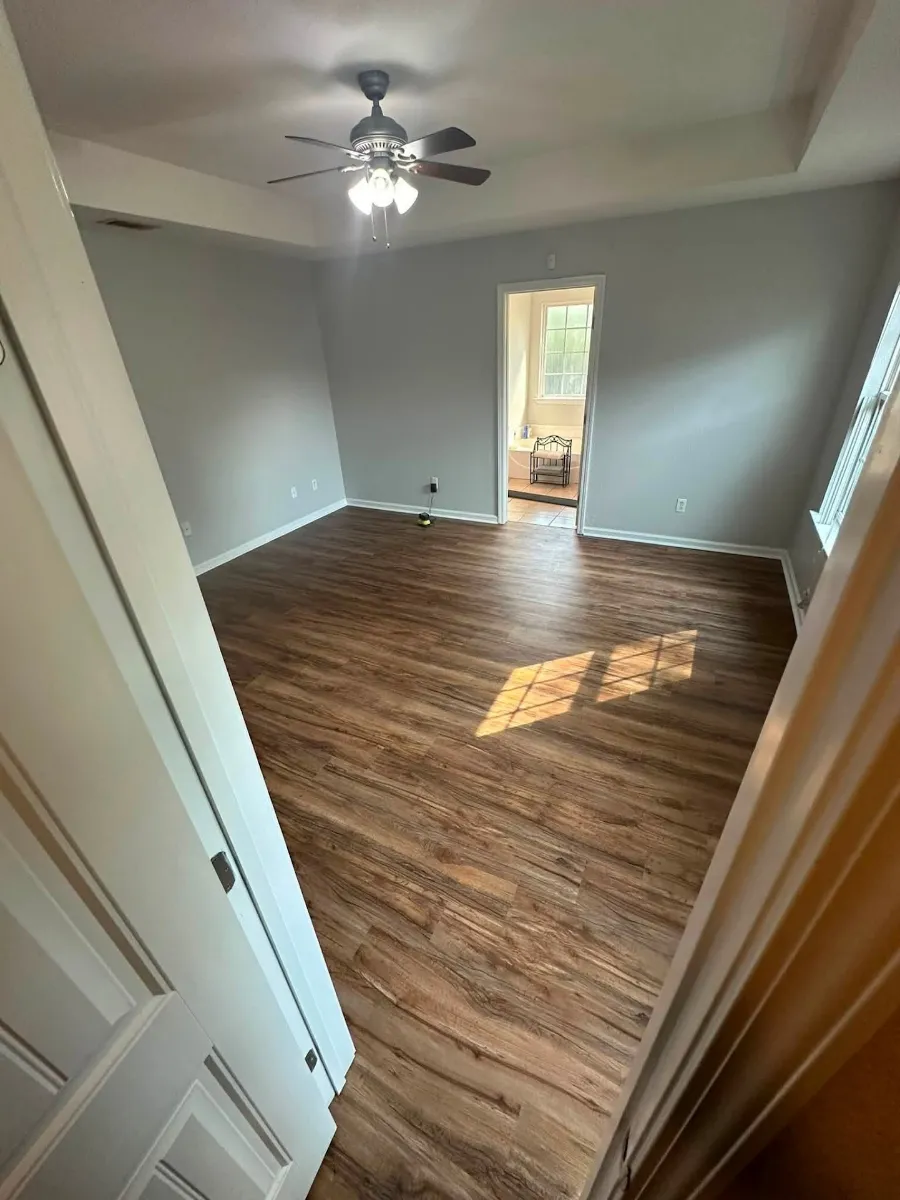The same room with new flooring after the rebuild