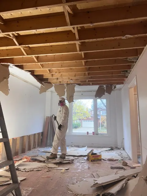 Room stripped to the joists and studs after water damage