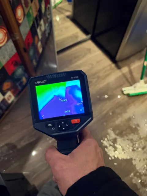 Thermal camera showing a cold, wet area on the floor